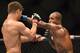 July 26, 2014; San Jose, CA, USA; Josh Thomson (red gloves) is punched by Bobby Green (blue gloves) during the lightweight bout of the FOX UFC Saturday at SAP Center. Mandatory Credit: Kyle Terada-USA TODAY Sports