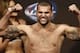 Aug 16, 2013; Boston, MA, USA; Shogun Rua flexes during the weigh-in for his UFC fight at TD Garden. Mandatory Credit: Winslow Townson-USA TODAY Sports