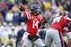 NASHVILLE, TN - DECEMBER 30: Bo Wallace #14 of the Ole Miss Rebels passes the ball in the first half of action against the Georgia Tech Yellow Jackets during the Franklin American Mortgage Music City Bowl at LP Field on December 30, 2013 in Nashville, Ten