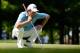 Jul 26, 2014; Ile Bizard, Quebec, CAN; Tim Clark reads the green of the 12th hole during the third round of the RBC Canadian Open at Royal Montreal GC - Blue Course. Mandatory Credit: Eric Bolte-USA TODAY Sports