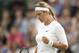 Jun 25, 2014; London, United Kingdom; Victoria Azarenka (BLR) reacts during her match against Bojana Jovanovski (SRB) on day three of the 2014 Wimbledon Championships at the All England Lawn and Tennis Club. Mandatory Credit: Susan Mullane-USA TODAY Sport