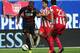 CHICAGO, IL - JULY 27: Glen Johnson #2 of Liverpool is defended by Dimitris Siovas #23 of Olympiacos FC during the International Champions Cup 2014 on July 27, 2014 at Soldier Field in Chicago, Illinois. (Photo by David Banks/Getty Images)