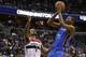 Feb 1, 2014; Washington, DC, USA; Oklahoma City Thunder small forward Kevin Durant (35) shoots the ball over Washington Wizards small forward Trevor Ariza (1) in the third quarter at Verizon Center. The Wizards won 96-81. Mandatory Credit: Geoff Burke-USA