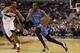 Feb 1, 2014; Washington, DC, USA; Oklahoma City Thunder small forward Kevin Durant (35) dribbles the ball past Washington Wizards small forward Trevor Ariza (1) in the third quarter at Verizon Center. The Wizards won 96-81. Mandatory Credit: Geoff Burke-U