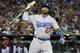 PHOENIX, AZ - MAY 18: Matt Kemp #27 of the Los Angeles Dodgers reacts after lining out for the third out with the bases loaded against the Arizona Diamondbacks during the eighth inning of a MLB game at Chase Field on May 18, 2014 in Phoenix, Arizona. (P
