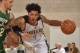 ORLANDO, FL - JULY 10: Elfrid Payton #4 of the Orlando Magic drives to the basket against the Boston Celtics during the Samsung NBA Summer League 2014 on July 10, 2014 at Amway Center in Orlando, Florida. NOTE TO USER: User expressly acknowledges and agre