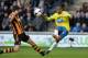 HULL, ENGLAND - MARCH 01: Loic Remy of Newcastle United shoots past Alex Bruce of Hull City during the Barclays Premier League match between Hull City and Newcastle United at KC Stadium on March 1, 2014 in Hull, England. (Photo by Tony Marshall/Getty Ima