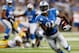 DETROIT, MI - NOVEMBER 28: Calvin Johnson #81 of the Detroit Lions runs for a third quarter touchdown while playing the Green Bay Packers at Ford Field on November 28, 2013 in Detroit, Michigan. (Photo by Gregory Shamus/Getty Images)