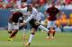 DENVER, CO - JULY 26: Wayne Rooney #10 of Manchester United follows through on a penalty goal during the first half of an International Champions Cup match against AS Roma at Sports Authority Field at Mile High on July 26, 2014 in Denver, Colorado. (Photo