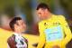 PARIS, FRANCE - JULY 27: Vincenzo Nibali of Italy and Astana Pro Team is congratulated on his victory on the podium by second placed Jean-Christophe Peraud of France and and AG2R La Mondiale (L) following the twenty first stage of the 2014 Tour de France
