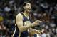 Apr 24, 2014; Atlanta, GA, USA; Indiana Pacers forward Luis Scola (4) talks to a teammate against the Atlanta Hawks in the second quarter in game three of the first round of the 2014 NBA Playoffs at Philips Arena. Mandatory Credit: Brett Davis-USA TODAY S