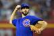 PHOENIX, AZ - JULY 20: Jake Arrieta #49 of the Chicago Cubs delivers a first inning pitch against the Arizona Diamondbacks at Chase Field on July 20, 2014 in Phoenix, Arizona. (Photo by Norm Hall/Getty Images)