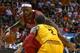 MIAMI, FL - DECEMBER 14: LeBron James #6 of the Miami Heat drives on Kyrie Irving #2 of the Cleveland Cavaliers during a game at American Airlines Arena on December 14, 2013 in Miami, Florida. NOTE TO USER: User expressly acknowledges and agrees that, b