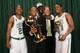 BOSTON - JUNE 17: (L-R) Ray Allen #20, Head Coach Doc Rivers, Kevin Garnett #5, General Manager Danny Ainge and Paul Pierce #34 of the Boston Celtics pose for a portrait with the Larry O'Brien trophy after defeating the Los Angeles Lakers in Game Six of t