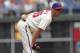 PHILADELPHIA - JULY 24: Starting pitcher Cole Hamels #35 of the Philadelphia Phillies looks in for the catcher's signs in the third inning during a game against the San Francisco Giants at Citizens Bank Park on July 24, 2014 in Philadelphia, Pennsylvania.