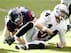 HOUSTON, TX- NOVEMBER 17: Matthew McGloin #14 of the Oakland Raiders is sacked by J.J. Watt #99 of the Houston Texans on November 17, 2013 at Reliant Stadium in Houston, Texas. Raiders won 28 to 23.(Photo by Thomas B. Shea/Getty Images)