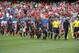 CHICAGO, IL - JULY 27: Players from Liverpool and Olympiacos FC enter the pitch before the International Champions Cup 2014 on July 27, 2014 at Soldier Field in Chicago, Illinois. (Photo by David Banks/Getty Images)