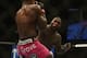 Apr 26, 2014; Baltimore, MD, USA; Anthony Johnson (right) strikes Phil Davis in the head during the first round of the fight against at Baltimore Arena. Johnson defeated Davis by decision. Mandatory Credit: Tommy Gilligan-USA TODAY Sports