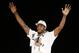 Jun 18, 2014; San Antonio, TX, USA; San Antonio Spurs forward Kawhi Leonard (2) waves to the crowd during NBA championship celebrations at Alamodome. Mandatory Credit: Soobum Im-USA TODAY Sports