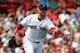 BOSTON, MA - JULY 20: Jon Lester #31 of the Boston Red Sox makes the assist on a ball hit by Alcides Escobar #2 of the Kansas City Royals in the second inning against at Fenway Park on July 20, 2014 in Boston, Massachusetts. (Photo by Jim Rogash/Getty I