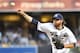 SAN DIEGO, CA - JULY 18: Ian Kennedy #22 of the San Diego Padres pitches during the first inning of a baseball game against the New York Mets at Petco Park July 18, 2014 in San Diego, California. (Photo by Denis Poroy/Getty Images)