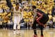 May 28, 2014; Indianapolis, IN, USA; Indiana Pacers forward Paul George (24) brings the ball upcourt as Miami Heat forward LeBron James (6) defends during the fourth quarter in game five of the Eastern Conference Finals of the 2014 NBA Playoffs at Bankers