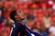 LANDOVER, MD - JULY 29: Chris Smalling #12 of Manchester United battles with Mauro Andreolli #9 of Inter Milan for the ball in the first half during their match in the International Champions Cup 2014 at FedExField on July 29, 2014 in Landover, Maryland