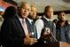 Former NBPA Executive Director Billy Hunter during the 2011 labor negotiations, with Roger Mason Jr. (far right) looking on.
