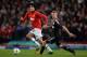 MANCHESTER, ENGLAND - SEPTEMBER 17: Marouane Fellaini of Manchester United competes with Lars Bender of Bayer Leverkusen during the UEFA Champions League Group A match between Manchester United and Bayer Leverkusen at Old Trafford on September 17, 2013 i