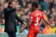 NORWICH, ENGLAND - APRIL 20: Raheem Sterling of Liverpool celebrates scoring the opening goal with Manager Brendan Rodgers of Liverpool during the Barclays Premier League match between Norwich City and Liverpool at Carrow Road on April 20, 2014 in Norwic