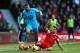 SOUTHAMPTON, ENGLAND - DECEMBER 22: Kyle Walker of Spurs is tackled by Morgan Schneiderlin of Southampton during the Barclays Premier League match between Southampton and Tottenham Hotspur at St Mary's Stadium on December 22, 2013 in Southampton, England