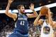 Apr 14, 2014; Oakland, CA, USA; Golden State Warriors guard Stephen Curry (30) shoots the ball against Minnesota Timberwolves forward Kevin Love (42) during the third quarter at Oracle Arena. The Golden State Warriors defeated the Minnesota Timberwolves 1