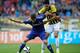 ARNHEM, NETHERLANDS - JULY 30: Marko Vejinovic of Vitesse and Marco van Ginkel of Chelsea battle for the ball during the pre season friendly match between Vitesse Arnhem and Chelsea at the Gelredome Stadium on July 30, 2014 in Arnhem, Netherlands. (Phot