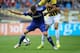 ARNHEM, NETHERLANDS - JULY 30: Marko Vejinovic of Vitesse and Marco van Ginkel of Chelsea battle for the ball during the pre season friendly match between Vitesse Arnhem and Chelsea at the Gelredome Stadium on July 30, 2014 in Arnhem, Netherlands. (Phot