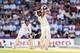 SOUTHAMPTON, ENGLAND - JULY 29: England wicketkeeper Jos Buttler looks on as India batsman Rohit Sharma hits out during day three of the 3rd Investec Test between England and India at Ageas Bowl on July 29, 2014 in Southampton, England. (Photo by Stu F