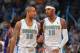 DENVER - MAY 23: Dahntay Jones #30 and Carmelo Anthony #15 of the Denver Nuggets talk on the court in Game Three of the Western Conference Finals against the Los Angeles Lakers during the 2009 NBA Playoffs at the Pepsi Center on May 23, 2009 in Denver, C