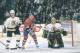 Canadiens forward Valeri Bure #18 waits for a pass while posted between Bruins defenceman Jon Rohloff #38 and goaltender Scott bailey #39 during a game at the Molson Centre during the 1996-97 season.(Photo by Denis Brodeur/NHLI via Getty Images)