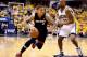 INDIANAPOLIS, IN - MAY 28: Michael Beasley #8 of the Miami Heat drives to the basket against David West #21 of the Indiana Pacers during Game Five of the Eastern Conference Finals of the 2014 NBA Playoffs at Bankers Life Fieldhouse on May 28, 2014 in Ind