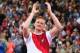 GLASGOW, SCOTLAND - JULY 30: Gold medalist Greg Rutherford of England celebrates after the Men's Long Jump Final at Hampden Park during day seven of the Glasgow 2014 Commonwealth Games on July 30, 2014 in Glasgow, United Kingdom. (Photo by Cameron Spenc
