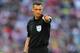 LONDON, ENGLAND - APRIL 13: Referee Andre Marriner looks on during the FA Cup with Budweiser semi-final match between Hull City and Sheffield United at Wembley Stadium on April 13, 2014 in London, England. (Photo by Mike Hewitt/Getty Images)