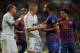 MADRID, SPAIN - DECEMBER 10: Seydou Keita (R) of FC Barcelona argues with Karim Benzema of Real Madrid during the la Liga match between Real Madrid and Barcelona at Estadio Santiago Bernabeu on December 10, 2011 in Madrid, Spain. (Photo by Jasper Juinen/