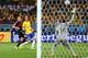 BELO HORIZONTE, BRAZIL - JULY 08: Andre Schuerrle of Germany scores his team's seventh goal past Julio Cesar of Brazil during the 2014 FIFA World Cup Brazil Semi Final match between Brazil and Germany at Estadio Mineirao on July 8, 2014 in Belo Horizonte