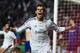 LISBON, PORTUGAL - MAY 24: Gareth Bale of Real Madrid celebrates scoring their second goal in extra time during the UEFA Champions League Final between Real Madrid and Atletico de Madrid at Estadio da Luz on May 24, 2014 in Lisbon, Portugal. (Photo by S