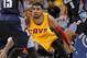 CLEVELAND, OH - APRIL 5: Kyrie Irving #2 of the Cleveland Cavaliers defends his position against Kemba Walker #15 of the Charlotte Bobcats at The Quicken Loans Arena on April 5, 2014 in Cleveland, Ohio. NOTE TO USER: User expressly acknowledges and agree