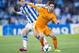 SAN SEBASTIAN, SPAIN - APRIL 05: Isco of Real Madrid CF duels for the ball with Sergio Canales of Real Sociedad during the La Liga match between Real Sociedad and Real Madrid CF at Estadio Anoeta on April 5, 2014 in San Sebastian, Spain. (Photo by Juan
