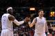 Dec 22, 2012; Miami, FL, USA; Miami Heat small forward LeBron James (left) greets teammate small forward Mike Miller (right) during the first half against the Utah Jazz at American Airlines Arena. Mandatory Credit: Steve Mitchell-USA TODAY Sports