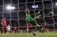 MADRID, SPAIN - FEBRUARY 13: David De Gea of Manchester United makes a save with his foot during the UEFA Champions League Round of 16 first leg match between Real Madrid and Manchester United at Estadio Santiago Bernabeu on February 13, 2013 in Madrid,