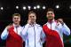 GLASGOW, SCOTLAND - JULY 31: Gold medalist Daniel Keatings of Scotland poses with silver medalist Max Whitlock (L) of England and bronze medalist Louis Smith of England during the medal ceremony for the Men's Pommel Horse Final at SSE Hydro during day ei