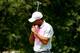Woods had to collect himself after three-putting on the first hole.