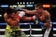LOS ANGELES, CA - APRIL 26: Lucas Matthysse punches John Molina during their fight at StubHub Center on April 26, 2014 in Los Angeles, California. (Photo by Joe Scarnici/Getty Images)